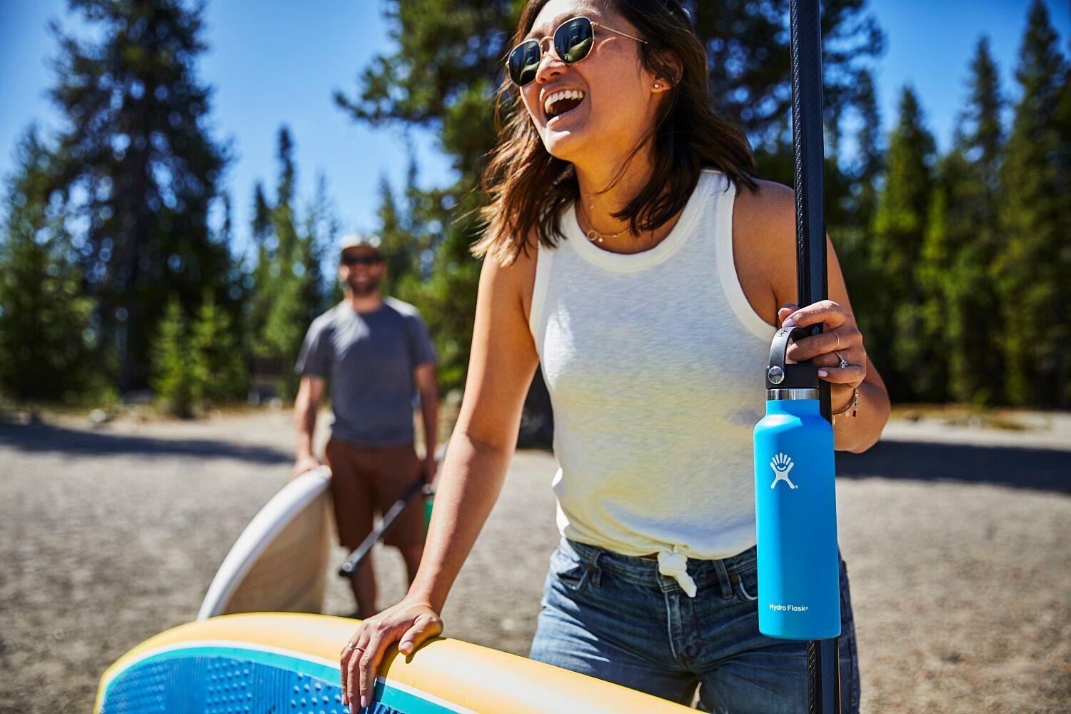 https://www.drivemerch.com/wp-content/uploads/2022/08/branded-hydro-flask-standard-mouth-with-flex-cap-21-oz-pacific-lifestyle.jpg